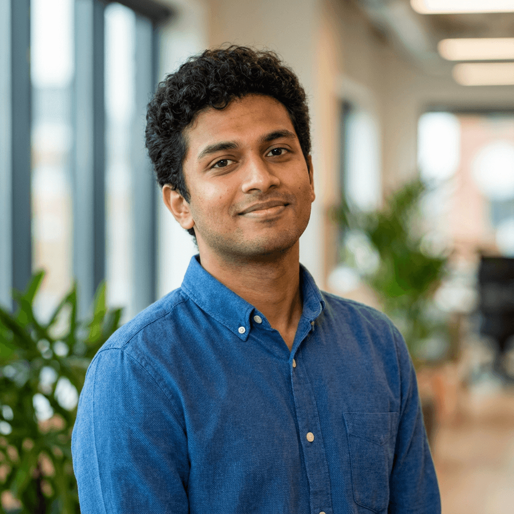 Male program manager in his 50s, South Asian